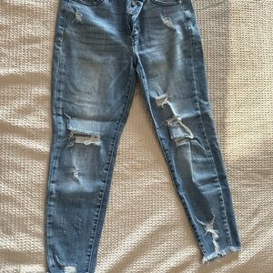 Distressed Blue Jeans